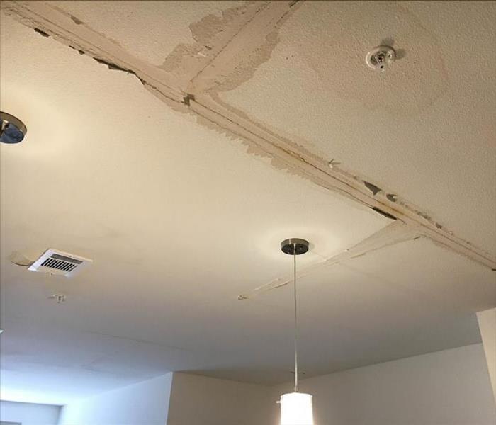 Moisture stains on ceiling.